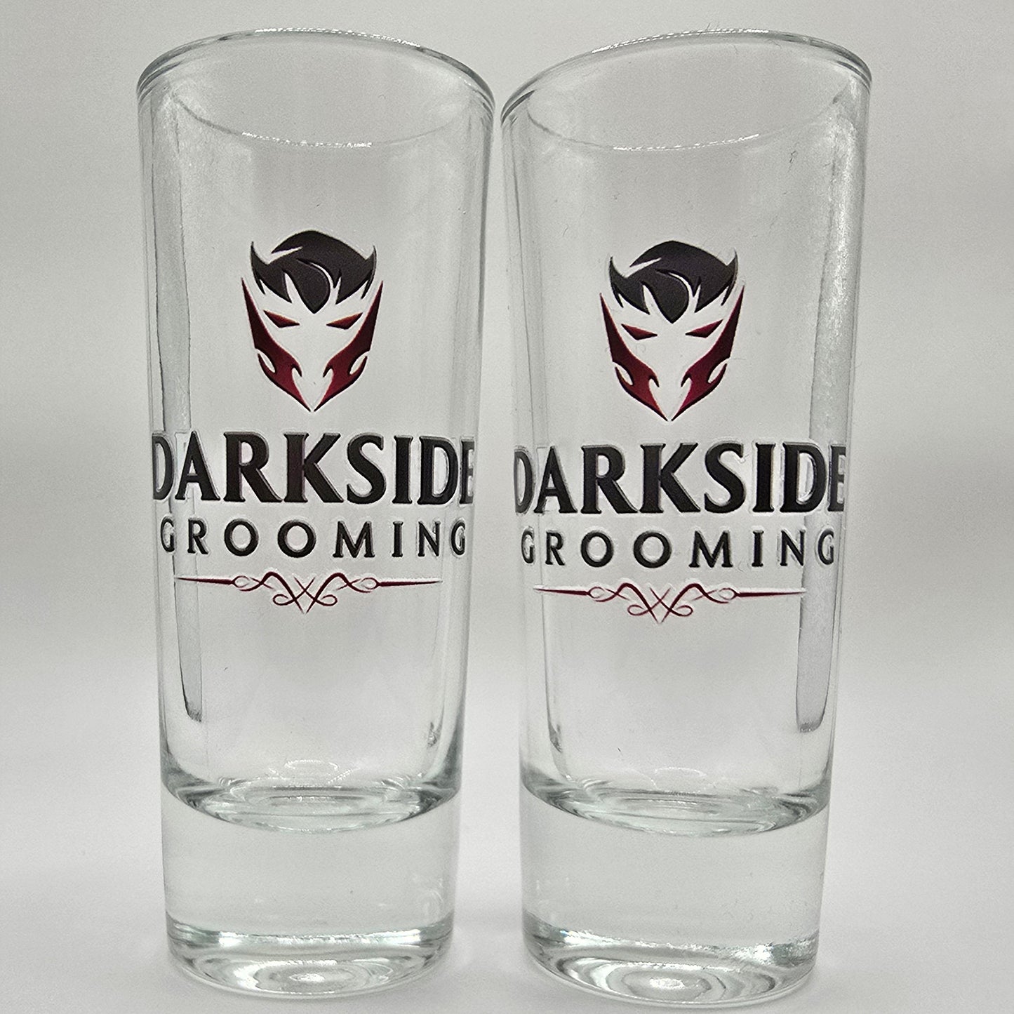 Shot glasses featuring Darkside Grooming logo