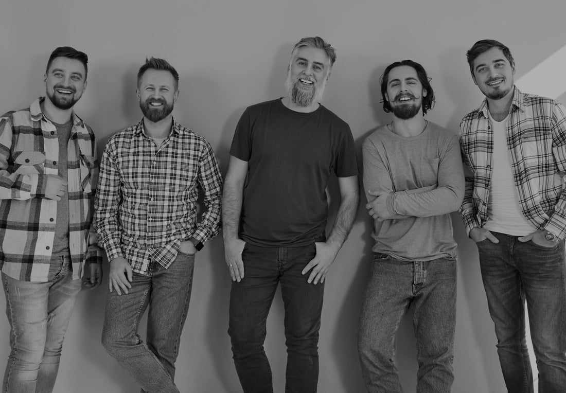 Black and white photo of a group of men with beards